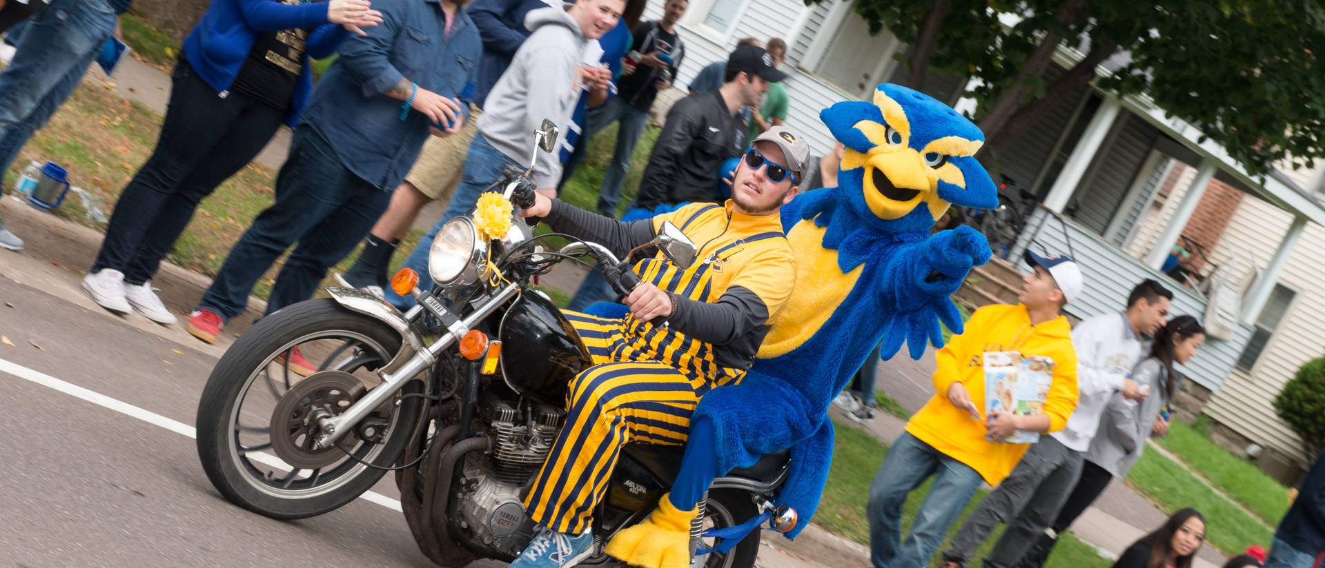 Homecoming Parade, Blu on a motorcycle