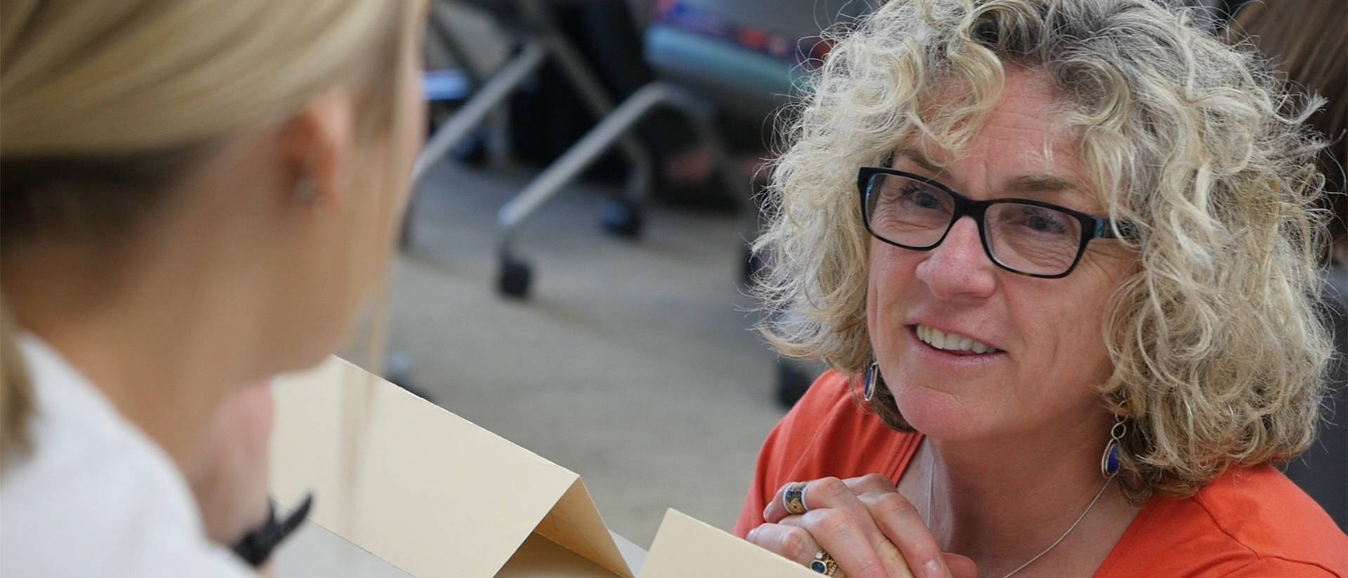 Dr. Rosemary Battalio engages with her students during an in-class activity.