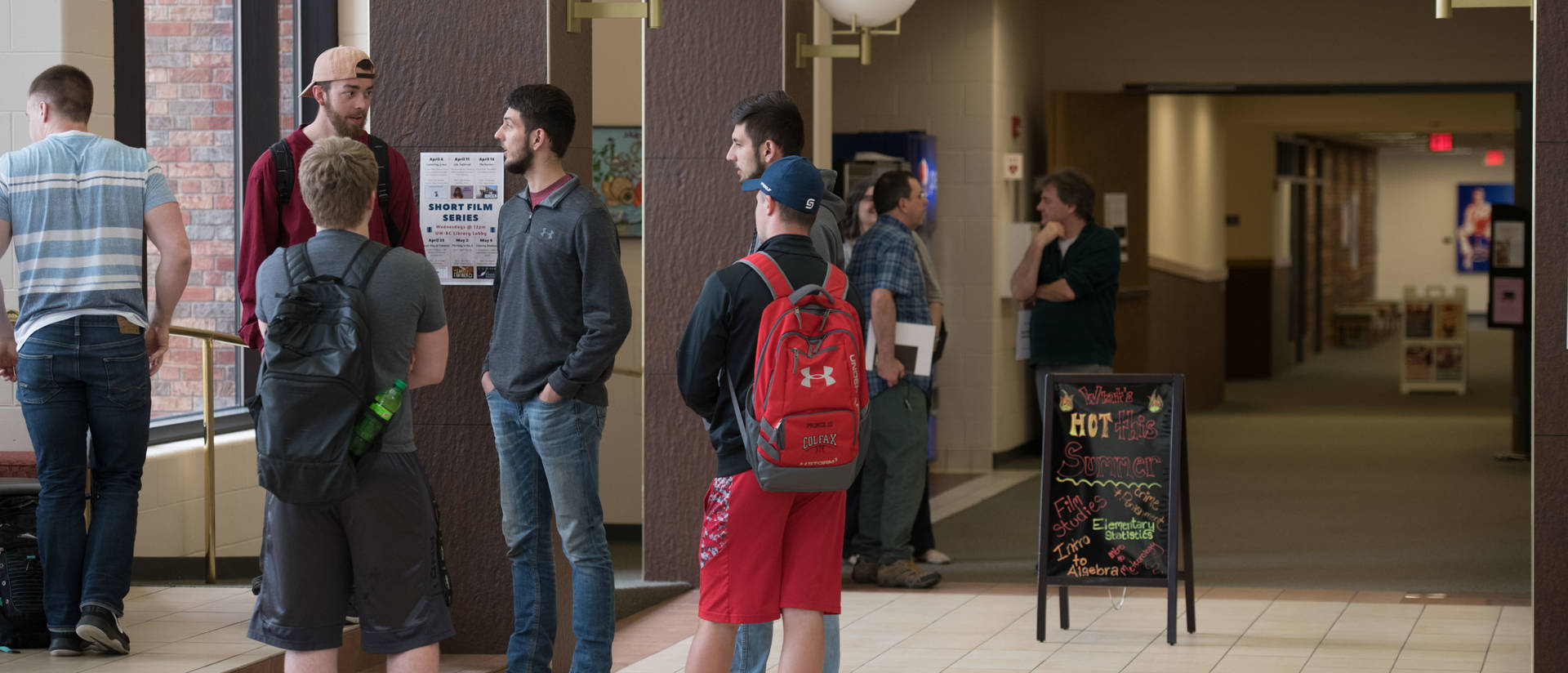 Students gathered in hallway of Ritzinger Hall in UW-Barron County