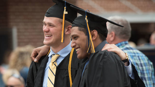 Male students at commencement