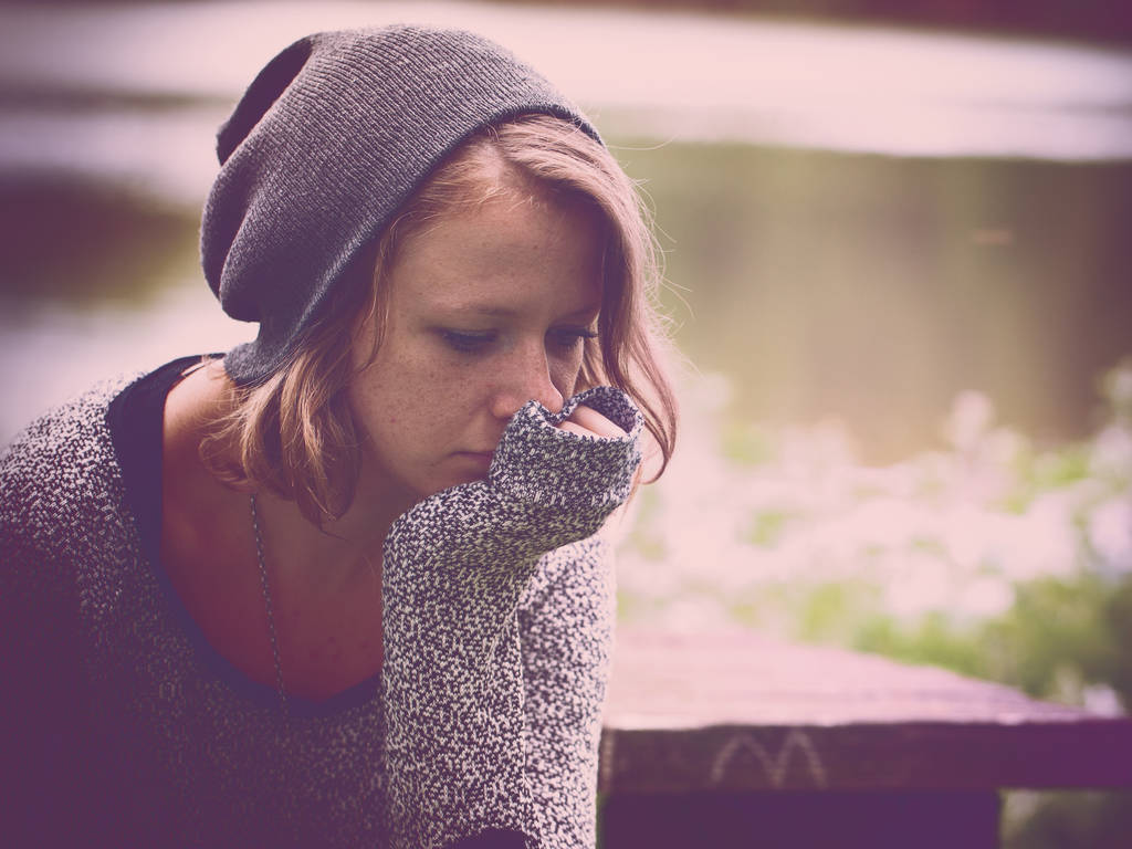 Young girl looking sad