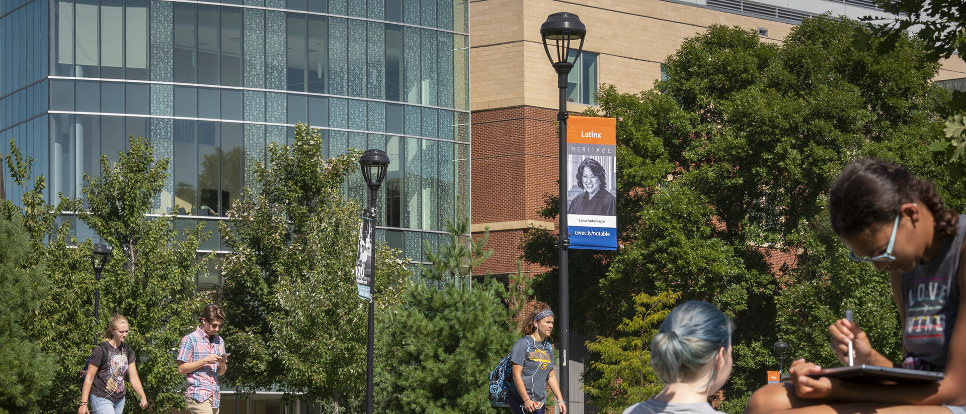 UWEC students studying outside on lower campus.