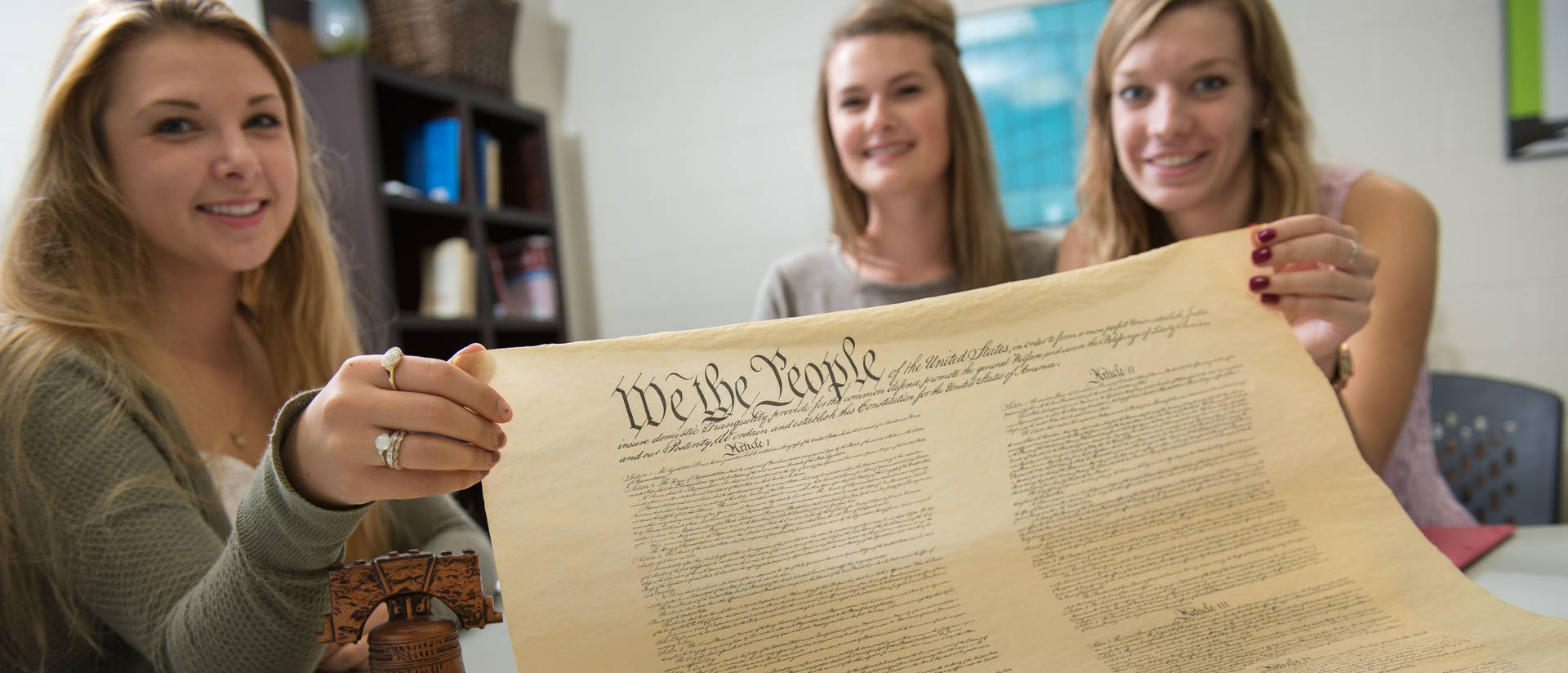 Political science students studying the constitution