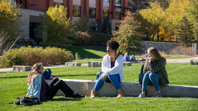 UW-Eau Claire students relax in between classes on the campus mall.