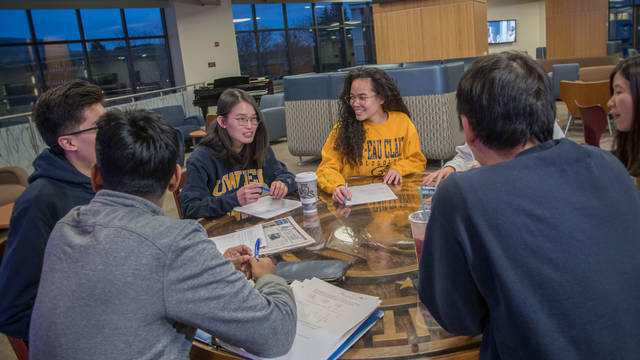 UW-Eau Claire students visit in Davies Center.