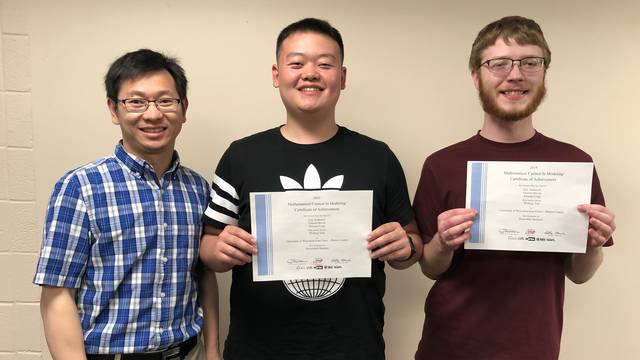 Vincent Biever, Eric Anderson, and Jinxuan Cong math team