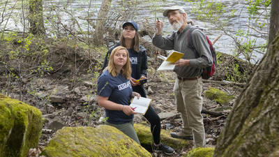 Doug Faulkner and students on Chippewa River bank