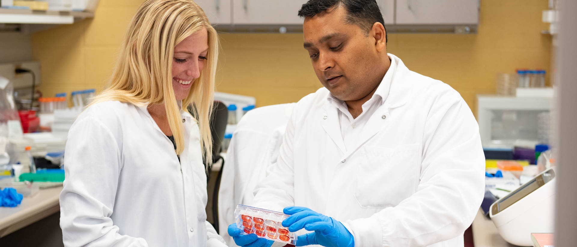 UREP Mayo in Rochester program, Megan Schleuster and Abhashek Chandra in the lab