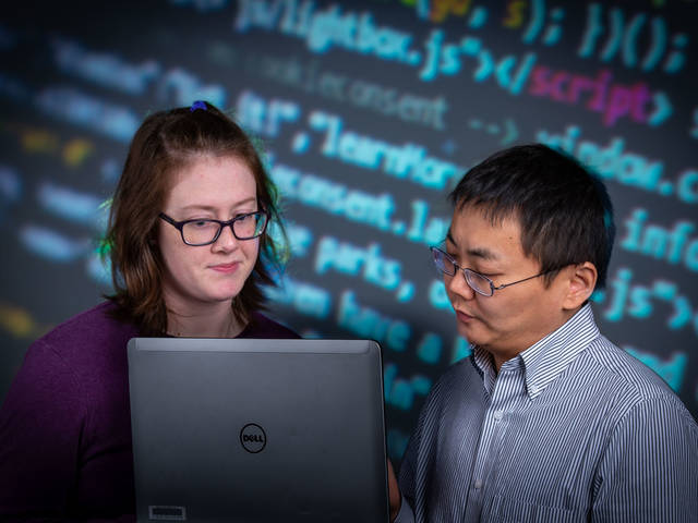 UW-Eau Claire student Emma Fischer and Dr. Ying Ma, associate professor of materials science