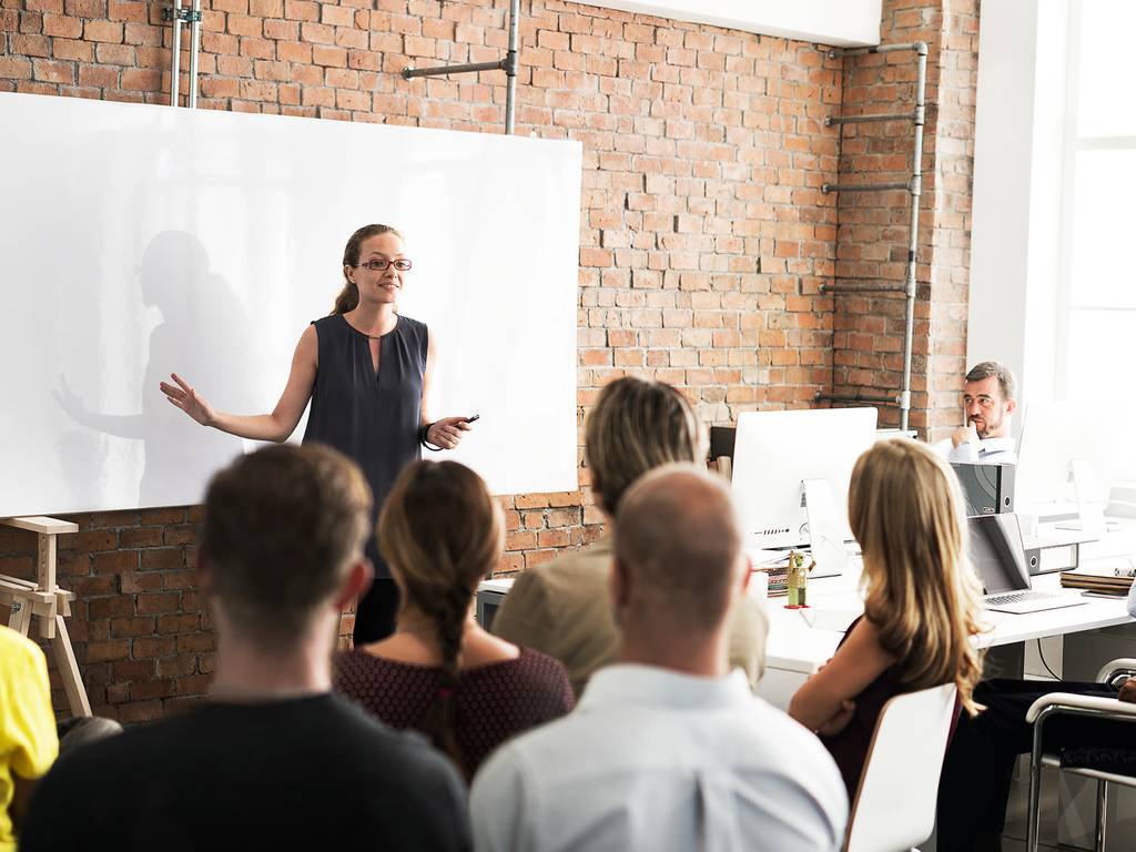 women instructing in a classroom