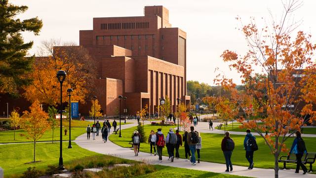 Students make their way through Garfield avenue on lower campus.