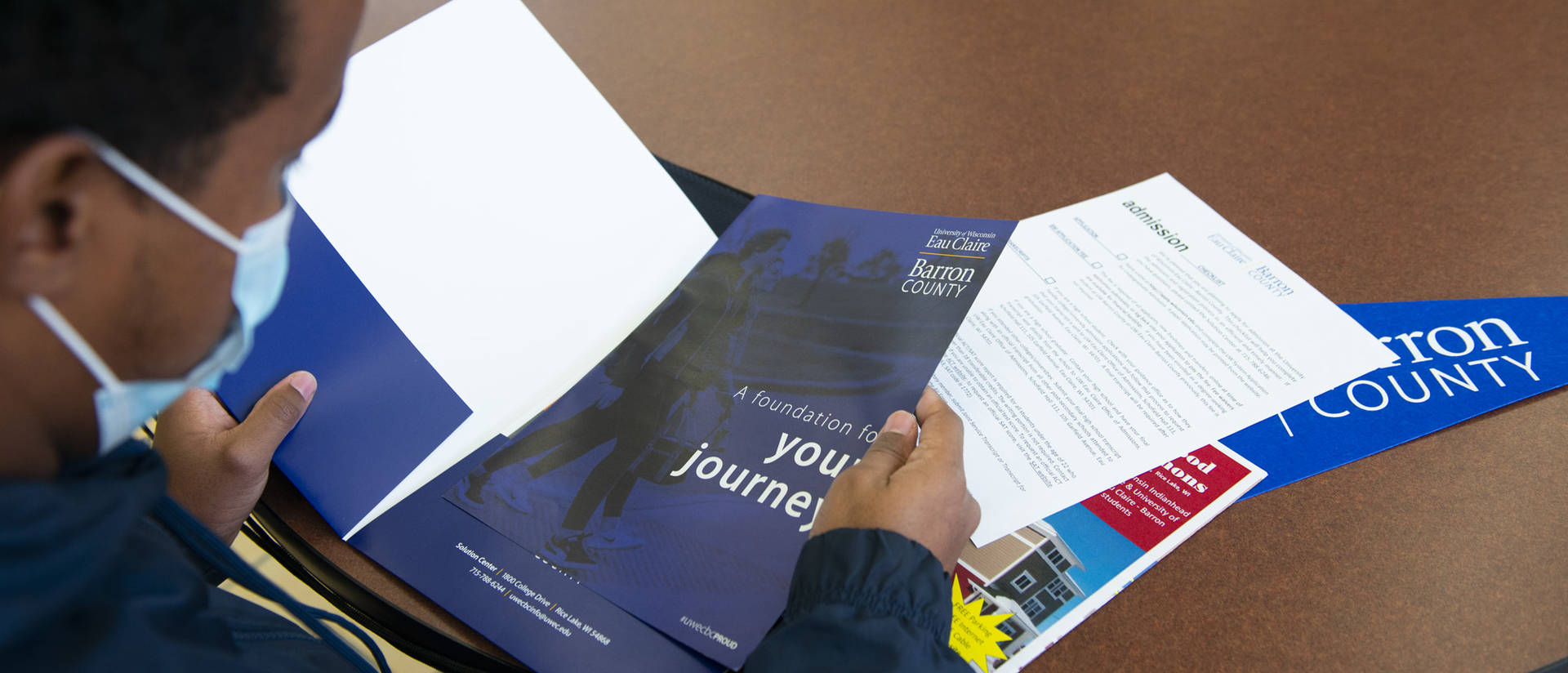 Student reviewing admission information for UWEC–BC