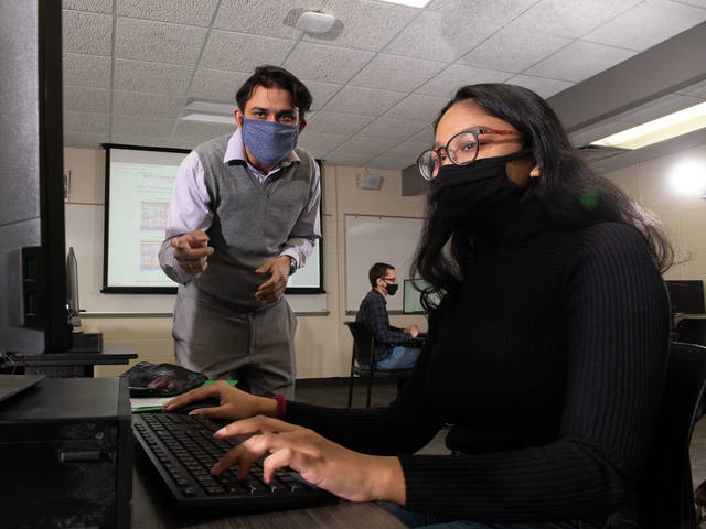 Dr. Rajeev Chaudhry and student