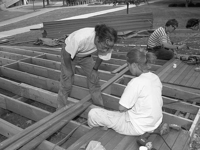 Kinji Akagawa installing the public garden he designed outside McIntyre Library