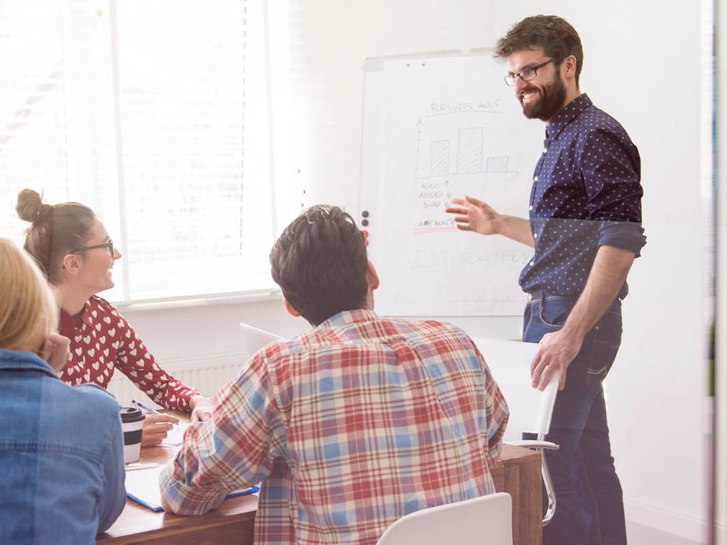 person presenting to a seated group