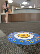 social distance sticker on the floor