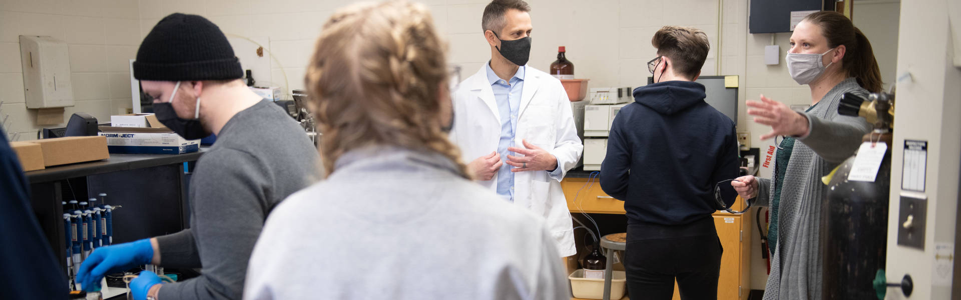 Materials science research lab, students and faculty working