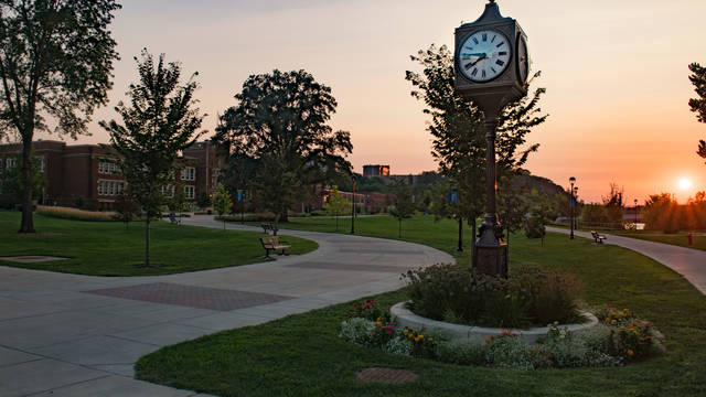 Campus beauty picture showing Schofield Hall and the clock tower.