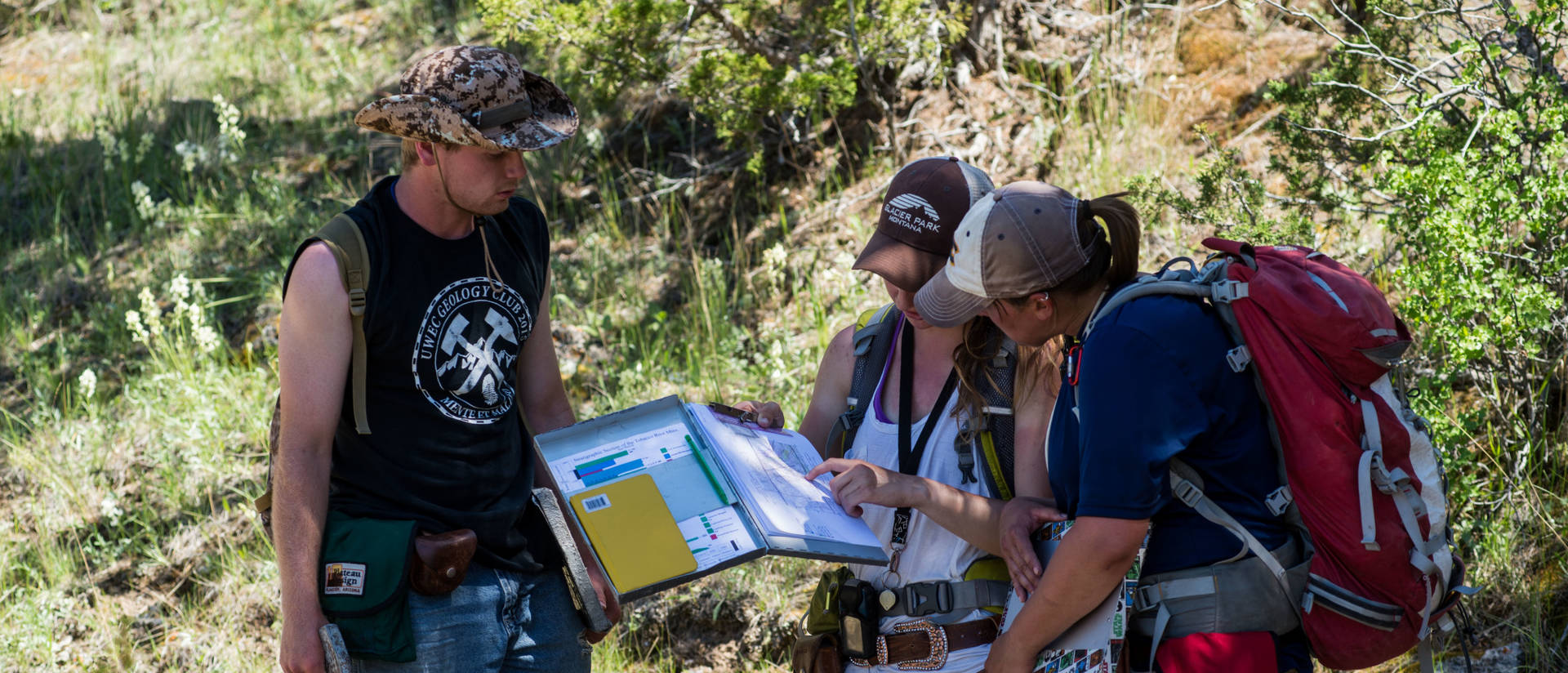 Geology students working on a capstone project outdoors