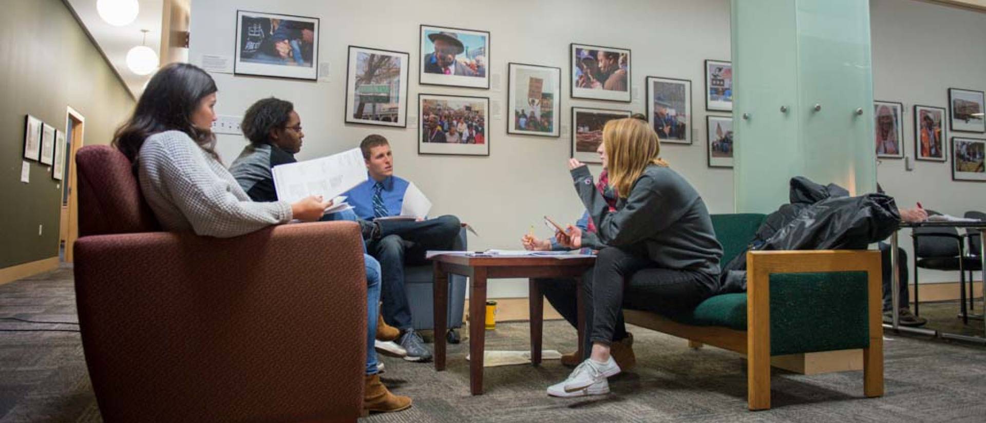 Communication students sitting in common area talking