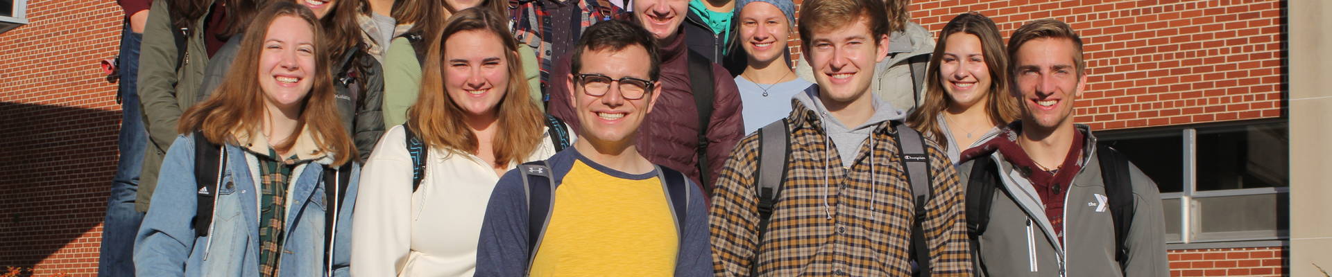 Honors Mentors standing outside the library