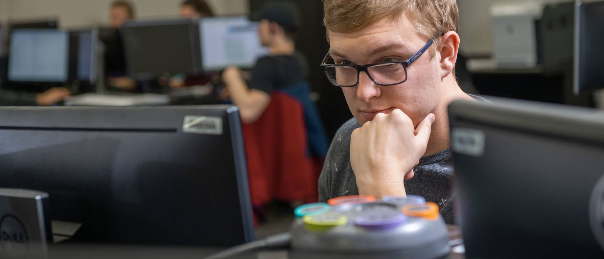 Student analyzing computer