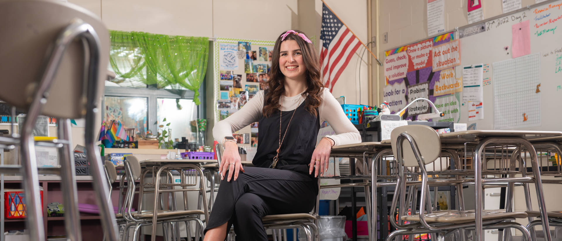 Blugold Elementary Education graduate Abbi Holzmann portraits in a Northstar Middle School classroom.