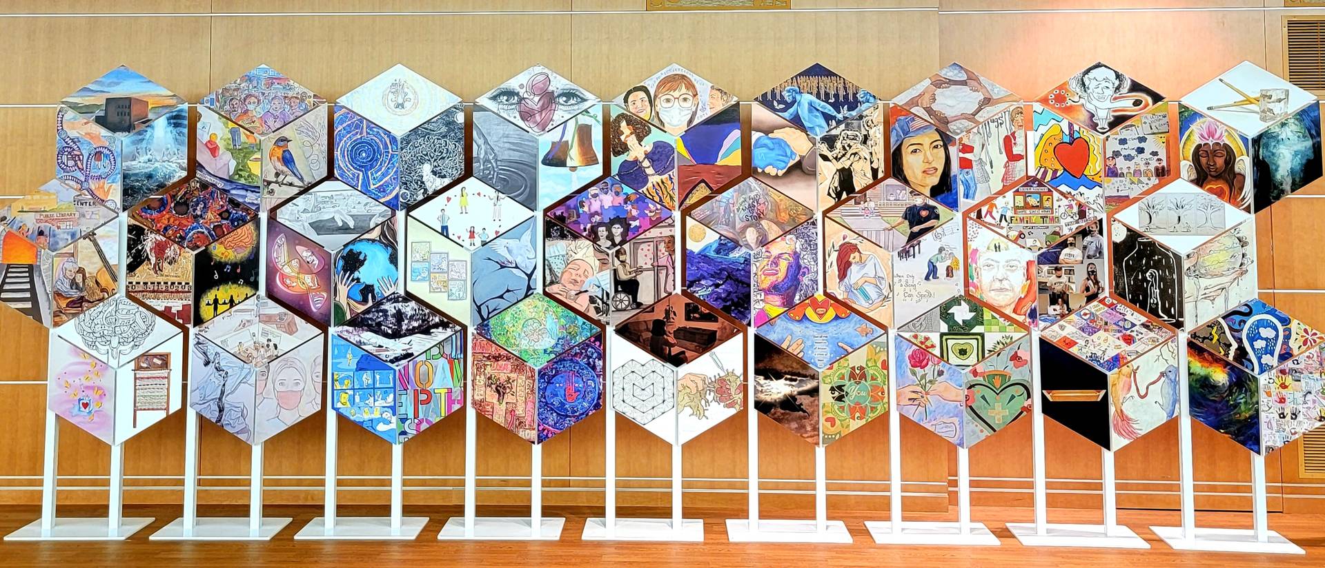 Nine stands of the Healing Reflections Mural