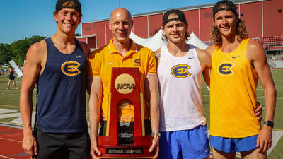 UW-Eau Claire decathletes, from left, Marcus Weaver, Abrahm Schroedl and Mitch Stegeman, pose with Blugold head track and field coach Chip Schneider and the outdoor national championship trophy.