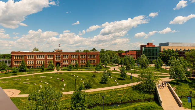 A view of Schofield Hall on a sunny day on campus.