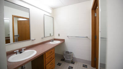 Two sinks in the bathroom area of a Chancellors Hall apartment.