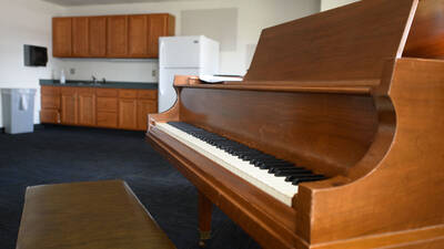 Piano in common space in Chancellors Hall.