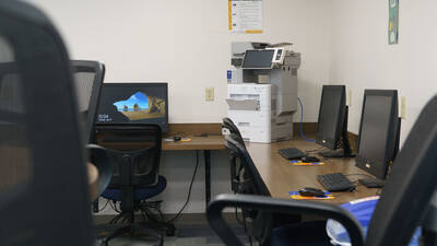 Computers in Towers Hall with printers.