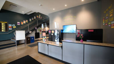 Lobby of a residence hall with a front desk