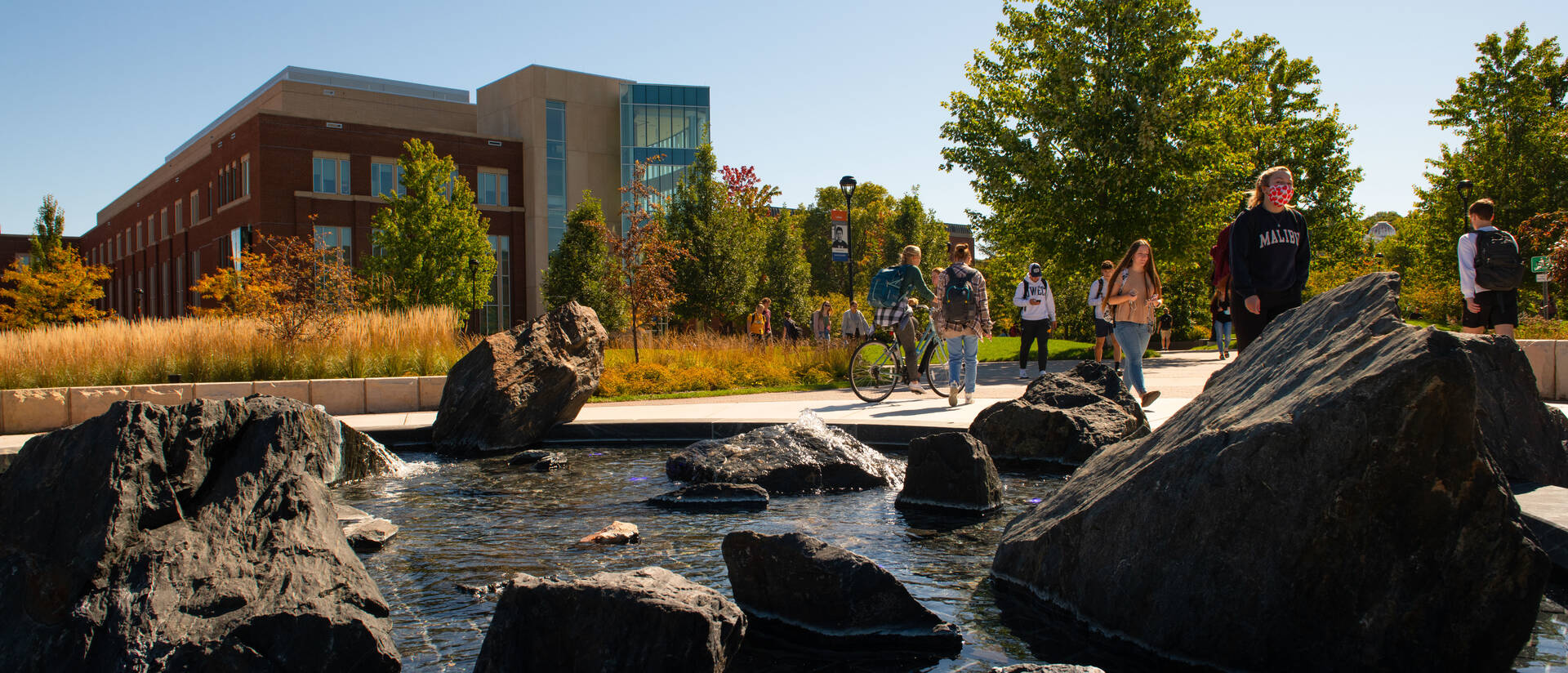 Students walking across campus in between classes.