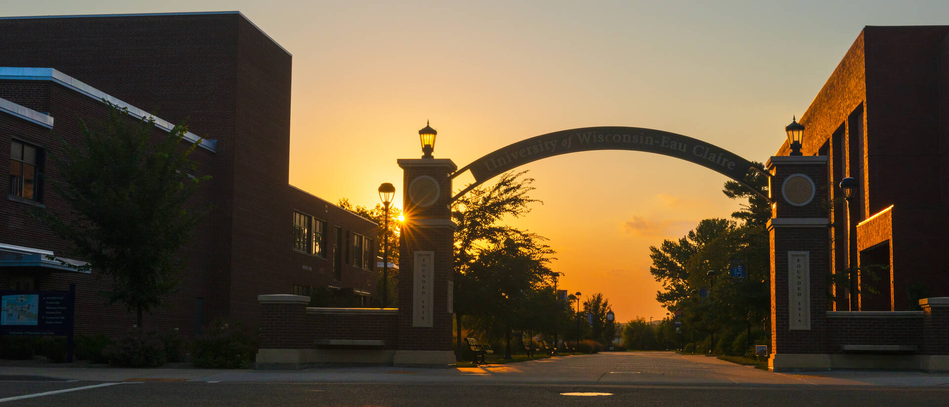 Sunset colors behind the University of Wisconsin Eau Claire arch.