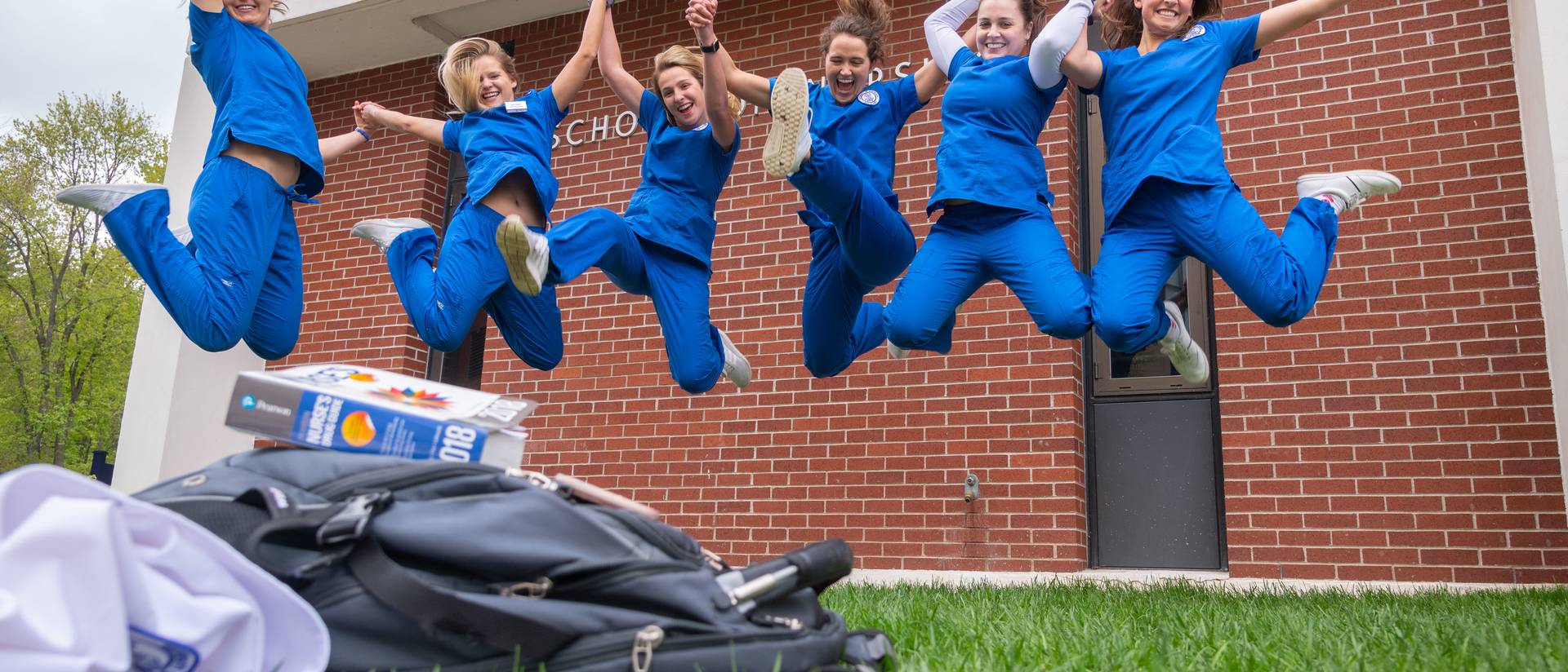 Nursing students jumping