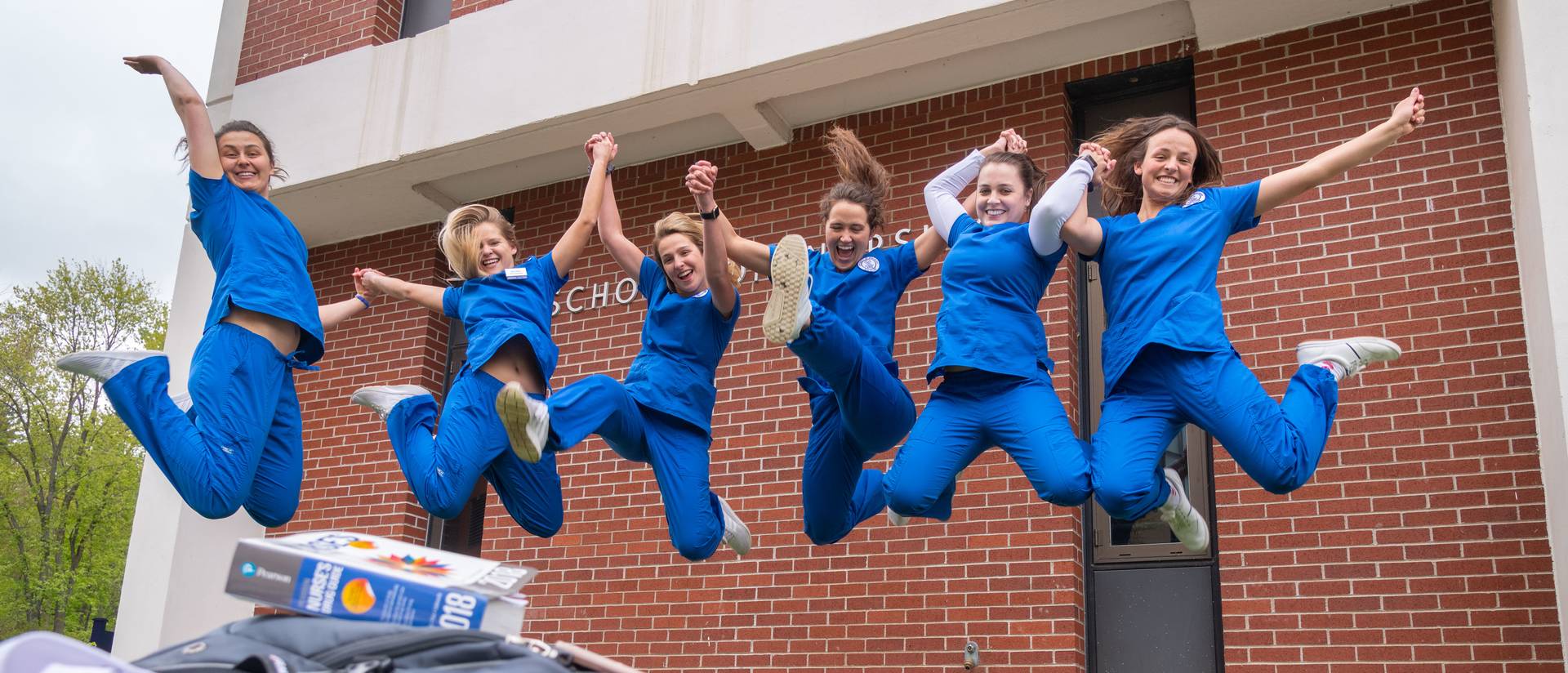 Nursing students jumping