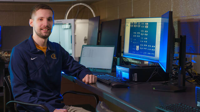 Jordan Langlois, a senior computer science major, is part of a UW-Eau Claire undergraduate research team that studied how machine learning was used to solve problems related to COVID-19.  (Photo by Bill Hoepner)