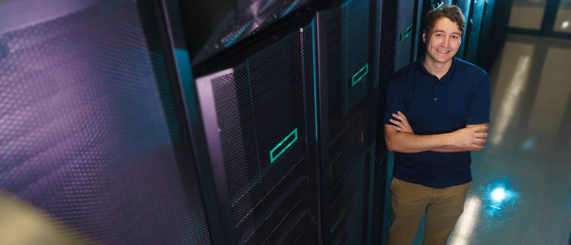 Tyler Bauer in the supercomputer cluster at CVTC