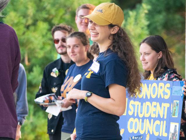 Group of students with poster for Honors Student Council