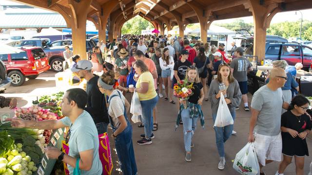 A UW-Eau Claire research team is working with the Eau Claire Downtown Farmers Market on a program that helps community members who are food insecure. (Photo by Shane Opatz)