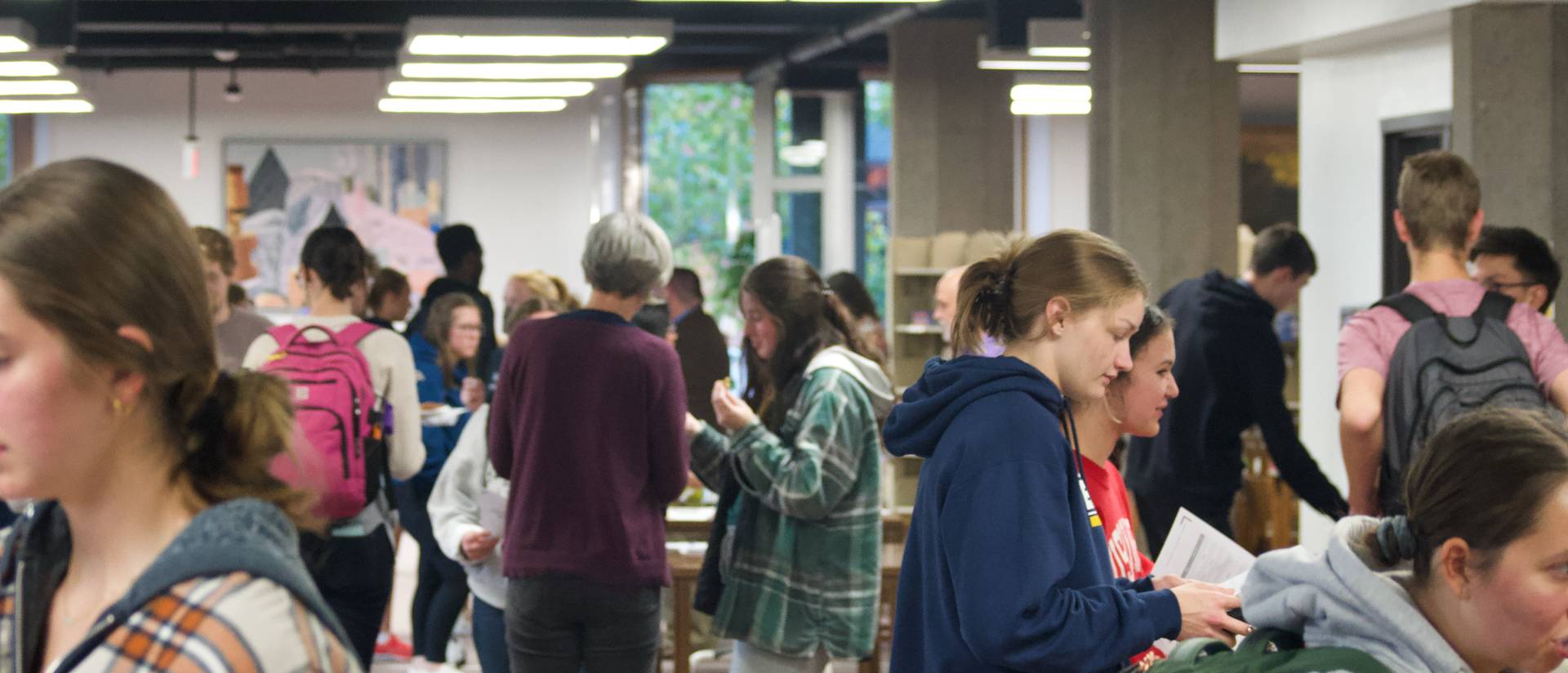 students and faculty mingle at the spring course preview