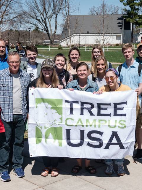 Group Photo with Tree Campus USA sign