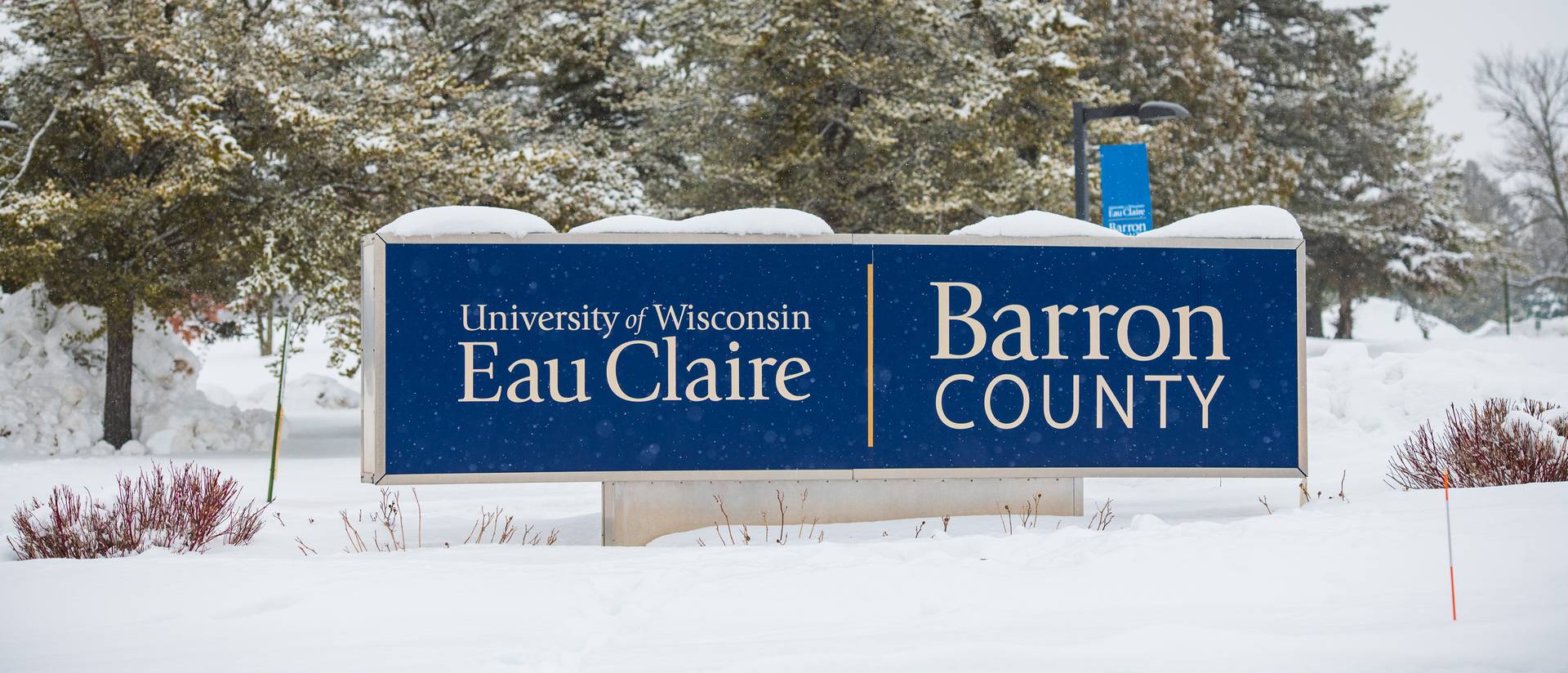 UW-Eau Claire – Barron County sign with snow, in winter