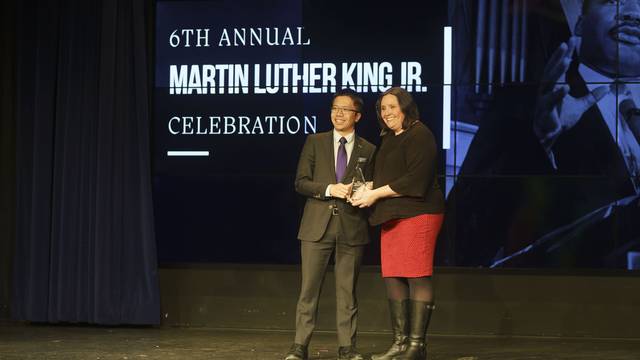 Two people on stage at the MLK celebration