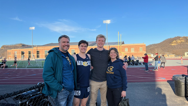student and family at track meet