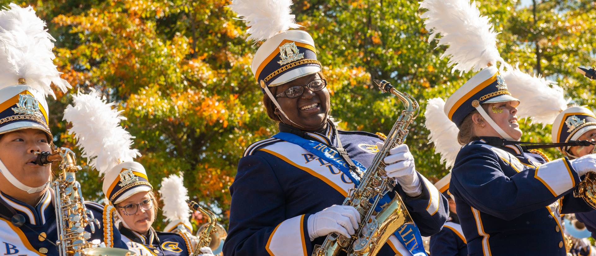 UWEC football fans tailgate and watch a performance by the BMB, Blugold Marching Band, prior to the Homecoming football game at Carson Park.