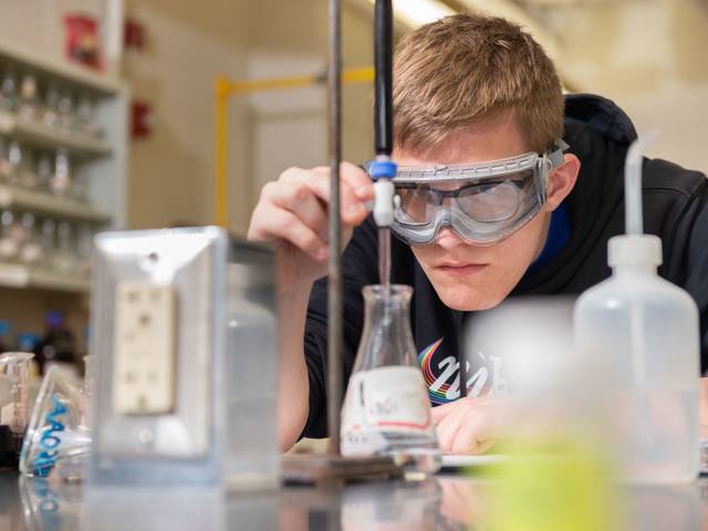 Students participate in chemistry classes.