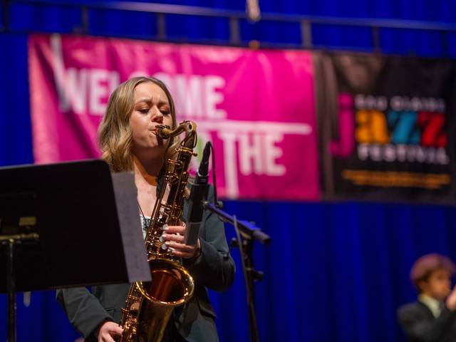 female saxophone player on stage